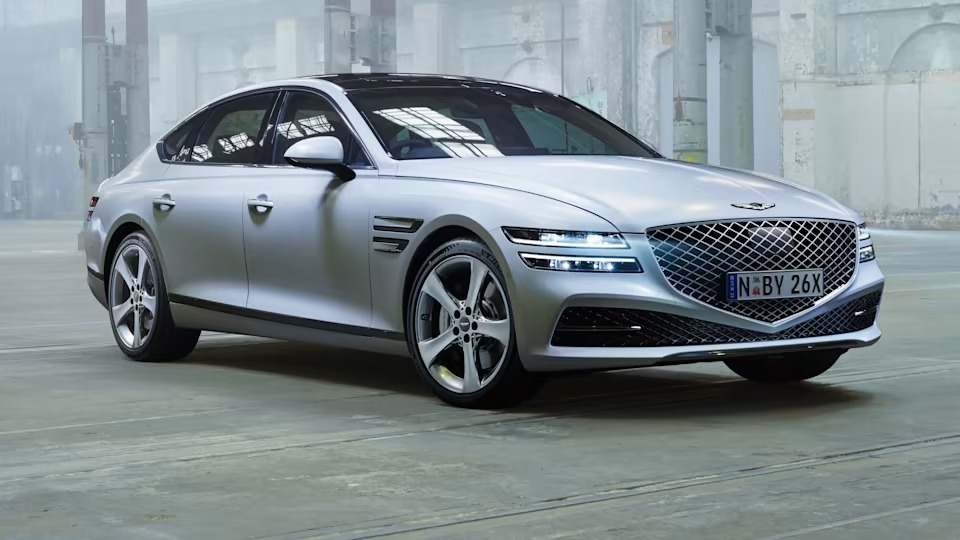 2023-genesis-g80-electric-front-side-angle-evtopspeed
