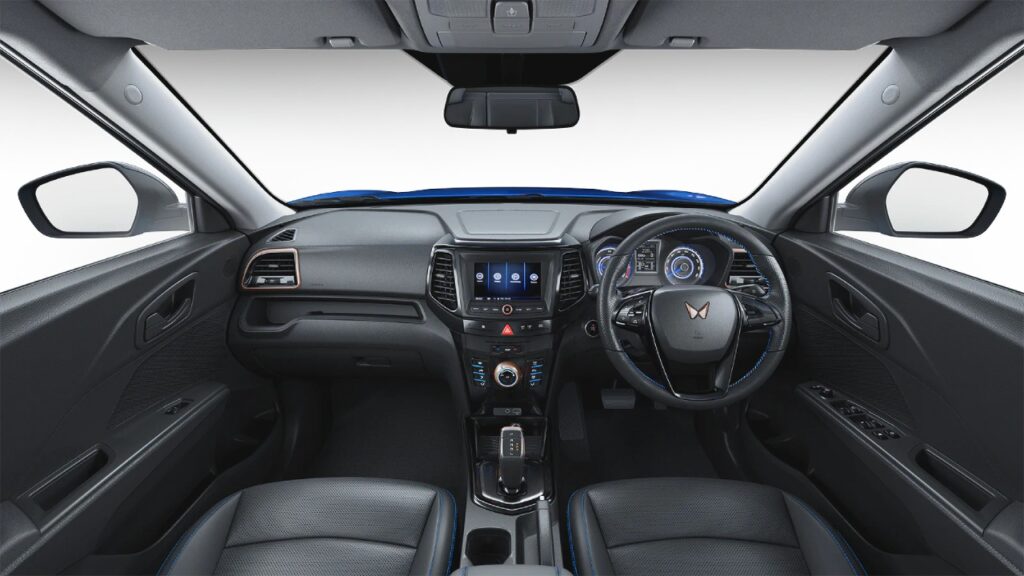 2023-mahindra-xuv400-interior-photo-steering-and-dashboard-evtopspeed